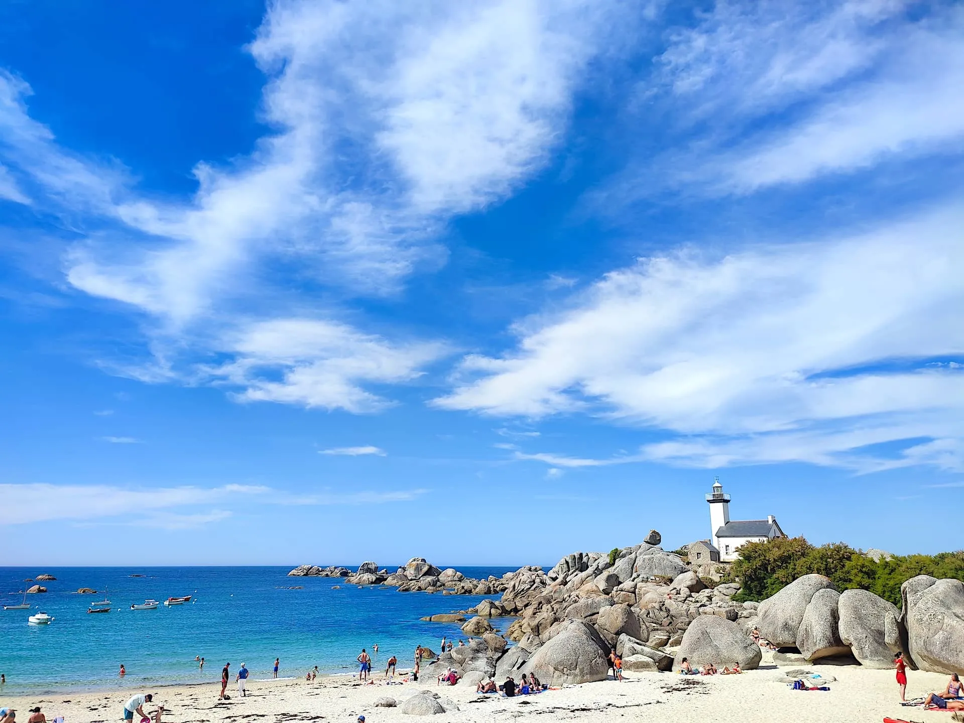 a beach in Brittany with turquoise waters