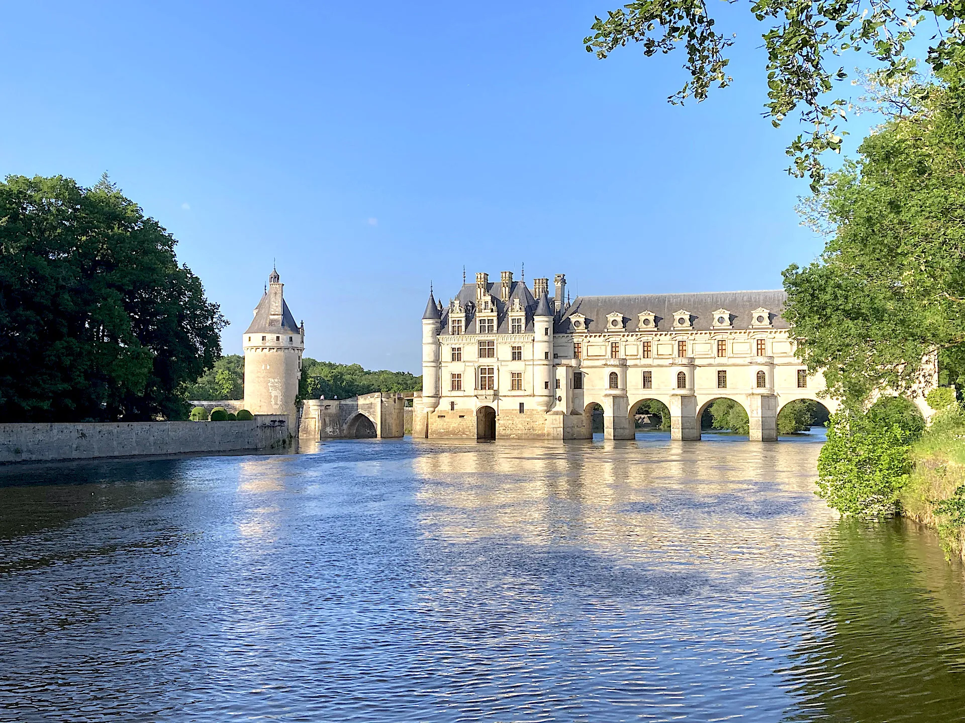The Château de Chenonceau, a UNESCO World Heritage Site, spans the Cher River in the Loire Valley.